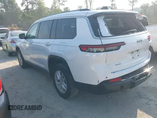 2023 Jeep Grand Cherokee Laredo with VIN 1C4RJKAG5P8881804, listed as a IAAI auction lot 42574642 with 54,046 mi miles and . Bid and sale history available at DreamBid. Image 3.