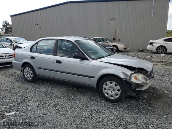 1999 Honda Civic DX with VIN 1HGEJ662XXL027828, listed as a Copart auction lot 72623664 with 133,302 mi miles and Salvage Title. Bid and sale history available at carsss.com. Image 4.