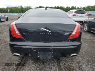 2013 Jaguar XJ Portfolio with VIN SAJWJ2GD0D8V44292, listed as a Copart auction lot 57073775 with 100,458 mi miles and Salvage Title. Bid and sale history available at DreamBid. Image 6.