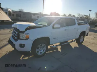 2015 GMC Canyon 2WD SLE with VIN 1GTG5BE3XF1239945, listed as a Copart auction lot 41541745 with 194,120 mi miles and Salvage Title. Bid and sale history available at carsss.com. Image 1.