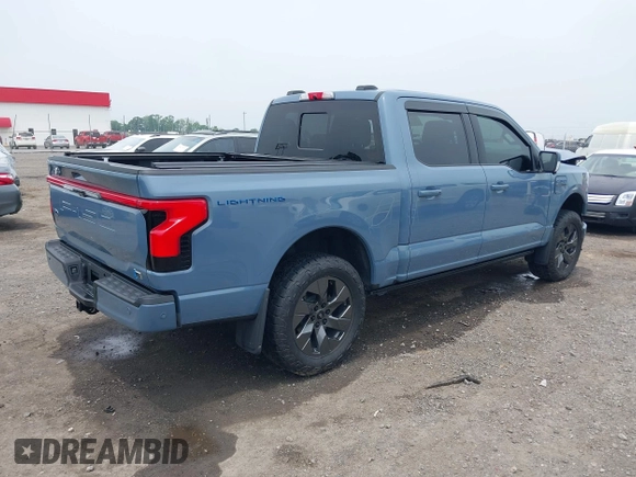 2023 Ford F-150 Lightning Pro with VIN 1FT6W1EVXPWG53591, listed as a IAAI auction lot 42249385 with 17,892 mi miles and . Bid and sale history available at DreamBid. Image 4.