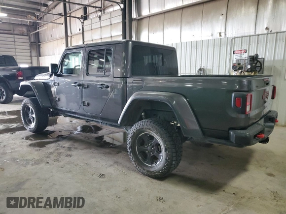 2021 Jeep Gladiator Rubicon with VIN 1C6JJTBG6ML579391, listed as a Copart auction lot 54626145 with 38,847 mi miles and Salvage title. Bid and sale history available at DreamBid. Image 2.
