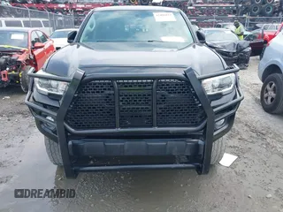 2016 Toyota Tacoma SR5 z VIN 5TFAZ5CN6GX012718, wystawiony jako IAAI lot #42408153 z przebiegiem 136 571 mil mil oraz . Historia ofert i sprzedaży dostępna na DreamBid. Obrazek 12.