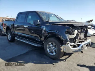 2024 Ford F-150 XLT with VIN 1FTFW3LD1RFA75938, listed as a Copart auction lot 78947444 with 14,674 mi miles and Salvage Title. Bid and sale history available at carsss.com. Image 4.