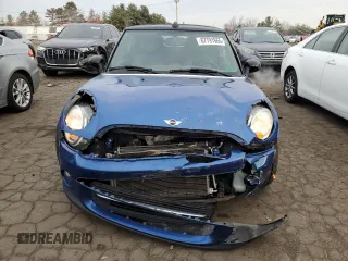 2014 MINI Convertible with VIN WMWZN3C53ET861225, listed as a Copart auction lot 87791665 with 104,151 mi miles and Salvage title. Bid and sale history available at DreamBid. Image 5.