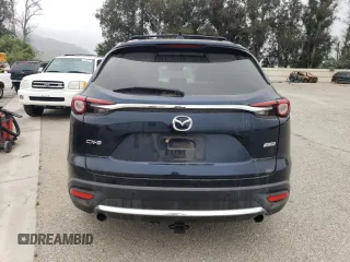 2017 Mazda CX-9 Grand Touring z VIN JM3TCADY3H0140573, wystawiony jako Copart lot #60513145 z przebiegiem 97 793 mil mil oraz Czysty tytuł • Clean title. Historia ofert i sprzedaży dostępna na DreamBid. Obrazek 6.
