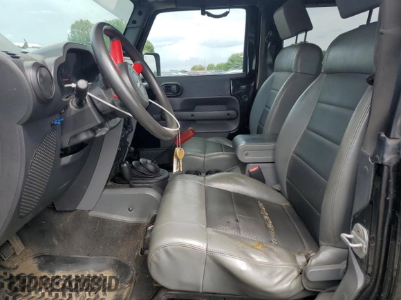 2009 Jeep Wrangler X with VIN 1J4FA24159L743572, listed as a Copart auction lot 63623425 with 138,964 mi miles and Clean title. Bid and sale history available at DreamBid. Image 7.