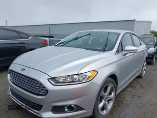 2013 Ford Fusion SE with VIN 3FA6P0HR5DR199082, listed as a IAAI auction lot 42191538 with 142,527 mi miles and . Bid and sale history available at DreamBid. Image 2.