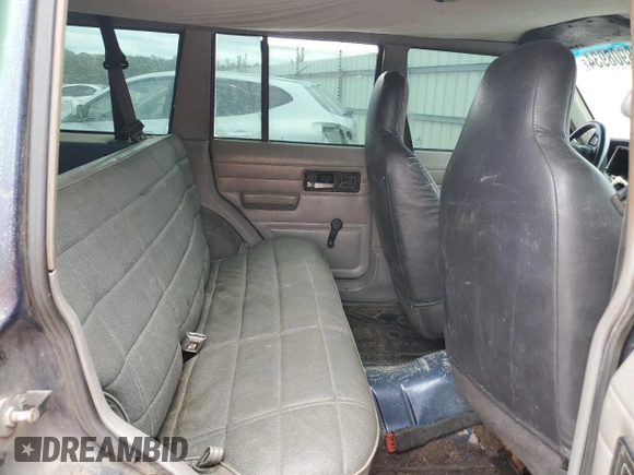 1996 Jeep Cherokee SE with VIN 1J4FT28S5TL244548, listed as a Copart auction lot 68908934 with 182,507 mi miles and Salvage Title. Bid and sale history available at carsss.com. Image 11.