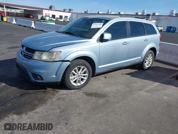 2013 Dodge Journey SXT with VIN 3C4PDCBG4DT584135, listed as a IAAI auction lot 41902149 with 165,700 mi miles and . Bid and sale history available at carsss.com. Image 2.