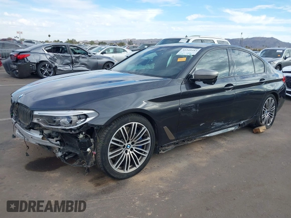 2019 BMW 5 Series M550i xDrive with VIN WBAJB9C51KB287797, listed as a IAAI auction lot 41549311 with 61,459 mi miles and . Bid and sale history available at DreamBid. Image 17.