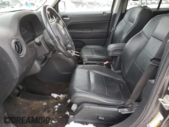 2015 Jeep Patriot North with VIN 1C4NJRAB7FD311725, listed as a Copart auction lot 82647074 with 185,560 mi miles and Salvage Title. Bid and sale history available at carsss.com. Image 7.