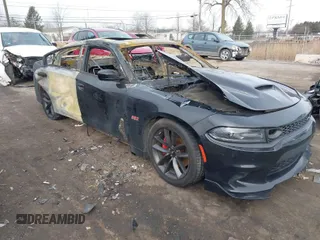 2019 Dodge Charger Scat Pack with VIN 2C3CDXGJ8KH579332, listed as a IAAI auction lot 41482173 with Not Provided miles and . Bid and sale history available at DreamBid. Image 1.