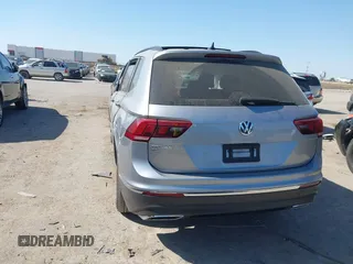 2021 Volkswagen Tiguan SE with VIN 3VV3B7AX0MM026064, listed as a IAAI auction lot 42038137 with 18,526 mi miles and . Bid and sale history available at DreamBid. Image 3.