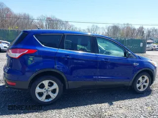 2013 Ford Escape SE with VIN 1FMCU0G95DUA74126, listed as a IAAI auction lot 42044641 with 132,330 mi miles and . Bid and sale history available at DreamBid. Image 13.