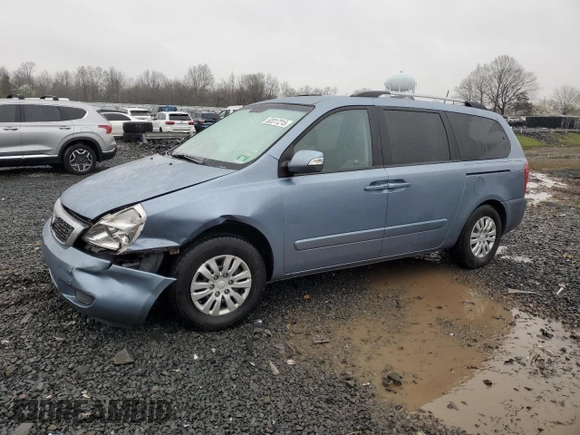 2012 Kia Sedona LX with VIN KNDMG4C70C6465733, listed as a Copart auction lot 52017215 with 149,800 mi miles and Salvage Title. Bid and sale history available at carsss.com. Image 1.