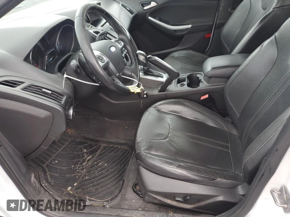 2013 Ford Focus SE with VIN 1FADP3K20DL118007, listed as a Copart auction lot 52184605 with 153,033 mi miles and Salvage Title. Bid and sale history available at DreamBid. Image 7.