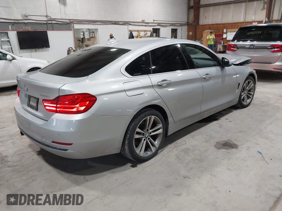 2016 BMW 4 Series 428i xDrive with VIN WBA4C9C5XGG138843, listed as a IAAI auction lot 41747358 with 63,804 mi miles and . Bid and sale history available at DreamBid. Image 4.