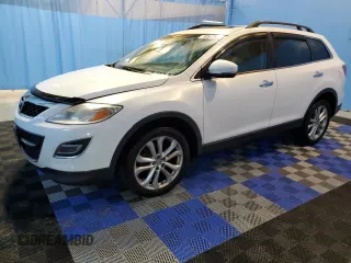 2012 Mazda CX-9 Grand Touring with VIN JM3TB3DV2C0366374, listed as a Copart auction lot 61179535 with 147,691 mi miles and Clean title. Bid and sale history available at DreamBid. Image 1.