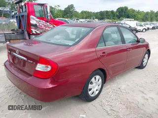 2002 Toyota Camry LE z VIN 4T1BE30K32U110304, wystawiony jako IAAI lot #42357455 z przebiegiem 221 389 mil mil oraz . Historia ofert i sprzedaży dostępna na DreamBid. Obrazek 4.