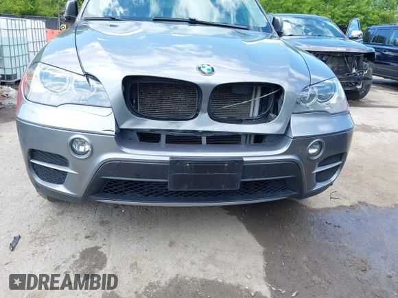 2012 BMW X5 35i z VIN 5UXZV4C50CL989684, wystawiony jako IAAI lot #42284840 z przebiegiem 134 056 mil mil oraz . Historia ofert i sprzedaży dostępna na DreamBid. Obrazek 6.