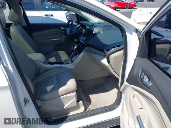 2013 Ford Escape SEL with VIN 1FMCU0HX1DUB99590, listed as a IAAI auction lot 41987910 with 129,954 mi miles. Bid and sale history available at carsss.com. Image 5.