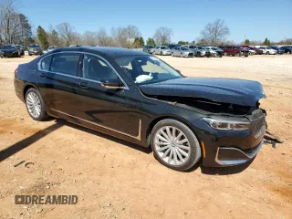 2020 BMW 7 Series 740i with VIN WBA7T2C07LCD79725, listed as a Copart auction lot 48498255 with 57,580 mi miles and Salvage title. Bid and sale history available at DreamBid. Image 4.