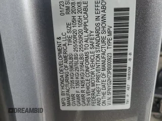 2023 Honda Pilot Touring with VIN 5FNYG2H73PB000923, listed as a Copart auction lot 41459755 with 39,829 mi miles and Salvage title. Bid and sale history available at DreamBid. Image 14.