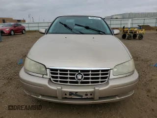 1998 Cadillac Catera z VIN W06VR52R5WR028774, wystawiony jako Copart lot #78085484 z przebiegiem 104 609 mil mil oraz Szkody całkowita. Historia ofert i sprzedaży dostępna na DreamBid. Obrazek 5.