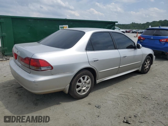 2001 Honda Accord LX z VIN 1HGCG564X1A135855, wystawiony jako Copart lot #57346815 z przebiegiem 235 585 mil mil oraz Szkoda całkowita • Salvage title. Historia ofert i sprzedaży dostępna na DreamBid. Obrazek 3.