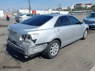 2008 Toyota Camry LE with VIN 4T1BK46K18U069959, listed as a IAAI auction lot 41690512 with 255,137 mi miles. Bid and sale history available at carsss.com. Image 4.