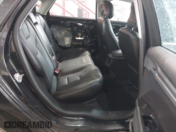 2013 Ford Fusion Titanium Hybrid with VIN 3FA6P0RU4DR281789, listed as a IAAI auction lot 41909115 with 161,008 mi miles and . Bid and sale history available at DreamBid. Image 8.