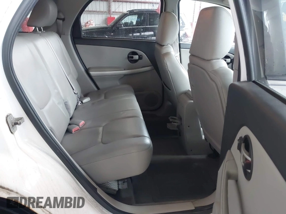 2005 Chevrolet Equinox LT z VIN 2CNDL73F856095869, wystawiony jako IAAI lot #42450905 z przebiegiem 145 307 mil mil oraz . Historia ofert i sprzedaży dostępna na DreamBid. Obrazek 8.