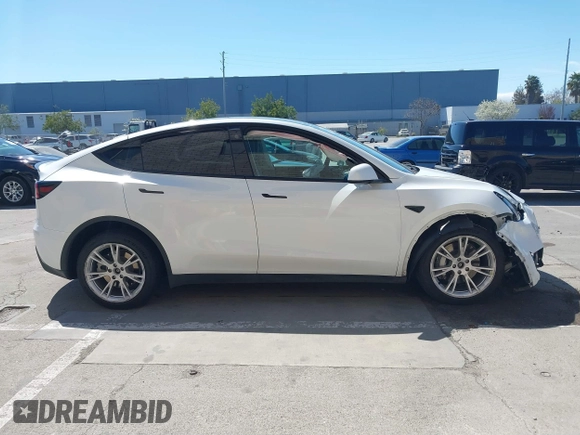 2023 Tesla Model Y Long Range with VIN 7SAYGDEE2PF696336, listed as a IAAI auction lot 41894686 with 34,203 mi miles. Bid and sale history available at carsss.com. Image 13.