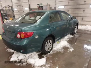 2010 Toyota Corolla with VIN 2T1BU4EE1AC279183, listed as a IAAI auction lot 41595679 with 85,191 mi miles. Bid and sale history available at carsss.com. Image 4.