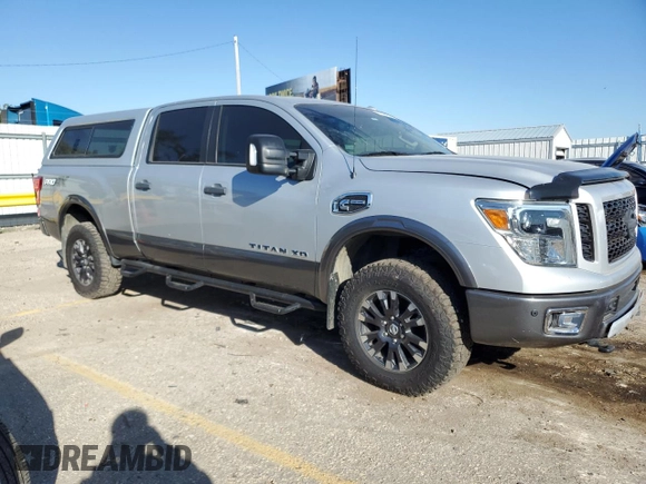 2016 Nissan Titan XD PRO-4X with VIN 1N6BA1F4XGN509643, listed as a Copart auction lot 74530434 with 83,734 mi miles and Clean Title. Bid and sale history available at carsss.com. Image 4.
