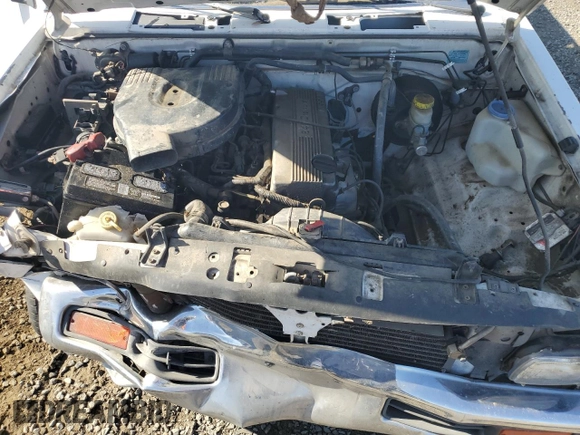 1997 Nissan Frontier XE with VIN 1N6SD16S5VC386896, listed as a Copart auction lot 57669835 with 343,173 mi miles and Salvage title. Bid and sale history available at DreamBid. Image 11.