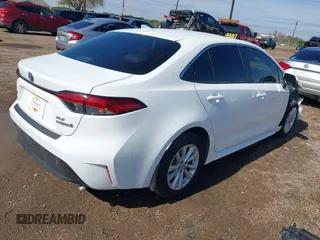 2024 Toyota Corolla Hybrid LE with VIN JTDBCMFEXR3055271, listed as a IAAI auction lot 41396359 with 8,654 mi miles. Bid and sale history available at carsss.com. Image 4.