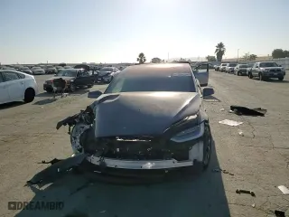 2022 Tesla Model X with VIN 7SAXCBE50NF329346, listed as a Copart auction lot 63855264 with 0 mi miles and Salvage Title. Bid and sale history available at carsss.com. Image 11.