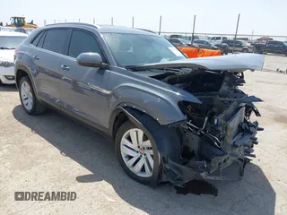 2022 Volkswagen Atlas SE z VIN 1V2WC2CA8NC215017, wystawiony jako IAAI lot #42093468 z przebiegiem 56 617 mil mil oraz . Historia ofert i sprzedaży dostępna na DreamBid. Obrazek 1.