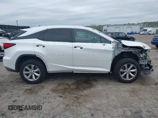 2016 Lexus RX 350 z VIN 2T2BZMCAXGC014817, wystawiony jako IAAI lot #42077588 z przebiegiem 91 035 mil mil oraz . Historia ofert i sprzedaży dostępna na DreamBid. Obrazek 12.