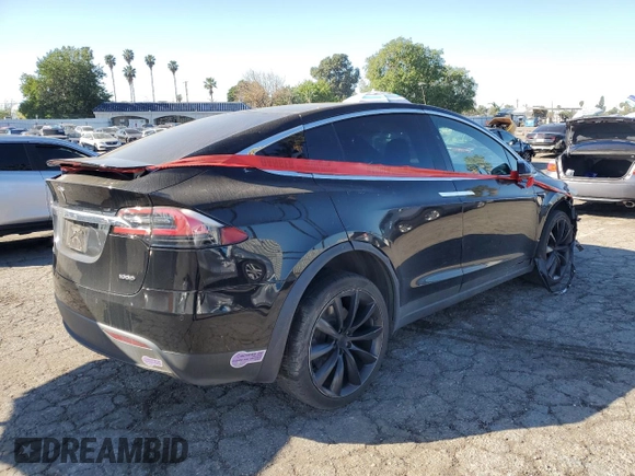 2018 Tesla Model X 75D with VIN 5YJXCAE24JF142506, listed as a Copart auction lot 43536215 with Not Provided miles and Salvage Title. Bid and sale history available at carsss.com. Image 3.