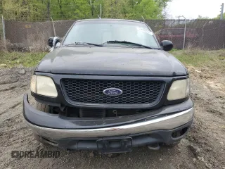 2000 Ford F-150 XL with VIN 1FTRX18W0YNC08668, listed as a Copart auction lot 53636035 with 0 mi miles and Salvage Title. Bid and sale history available at carsss.com. Image 5.