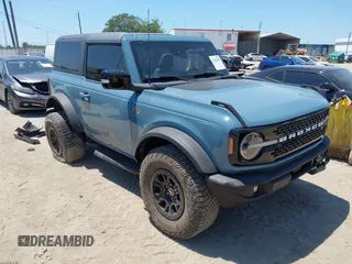 2021 Ford Bronco z VIN 1FMDE5CP5MLA98340, wystawiony jako IAAI lot #42064998 z przebiegiem 38 569 mil mil oraz . Historia ofert i sprzedaży dostępna na DreamBid. Obrazek 1.