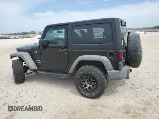 2015 Jeep Wrangler Sport with VIN 1C4AJWAG3FL723090, listed as a Copart auction lot 53325235 with 96,306 mi miles and Salvage title. Bid and sale history available at DreamBid. Image 2.