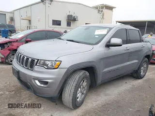 2018 Jeep Grand Cherokee Laredo E with VIN 1C4RJEAG8JC382825, listed as a IAAI auction lot 41288056 with 105,652 mi miles. Bid and sale history available at carsss.com. Image 17.