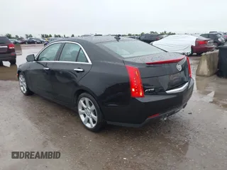 2014 Cadillac ATS Standard RWD with VIN 1G6AA5RX7E0112352, listed as a IAAI auction lot 42487515 with 98,009 mi miles and . Bid and sale history available at DreamBid. Image 3.