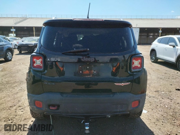 2015 Jeep Renegade Trailhawk z VIN ZACCJBCT9FPB21561, wystawiony jako Copart lot #63051673 z przebiegiem Nie podano mil oraz Szkoda całkowita • Salvage title. Historia ofert i sprzedaży dostępna na DreamBid. Obrazek 6.