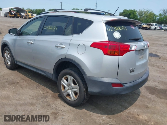 2015 Toyota RAV4 LE with VIN JTMBFREV6FJ039453, listed as a IAAI auction lot 42388671 with 200,304 mi miles and . Bid and sale history available at DreamBid. Image 3.