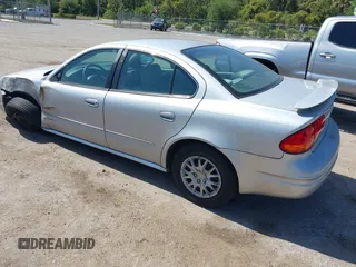 2004 Oldsmobile Alero GL1 z VIN 1G3NL52F54C206964, wystawiony jako IAAI lot #42160307 z przebiegiem 129 808 mil mil oraz . Historia ofert i sprzedaży dostępna na DreamBid. Obrazek 3.